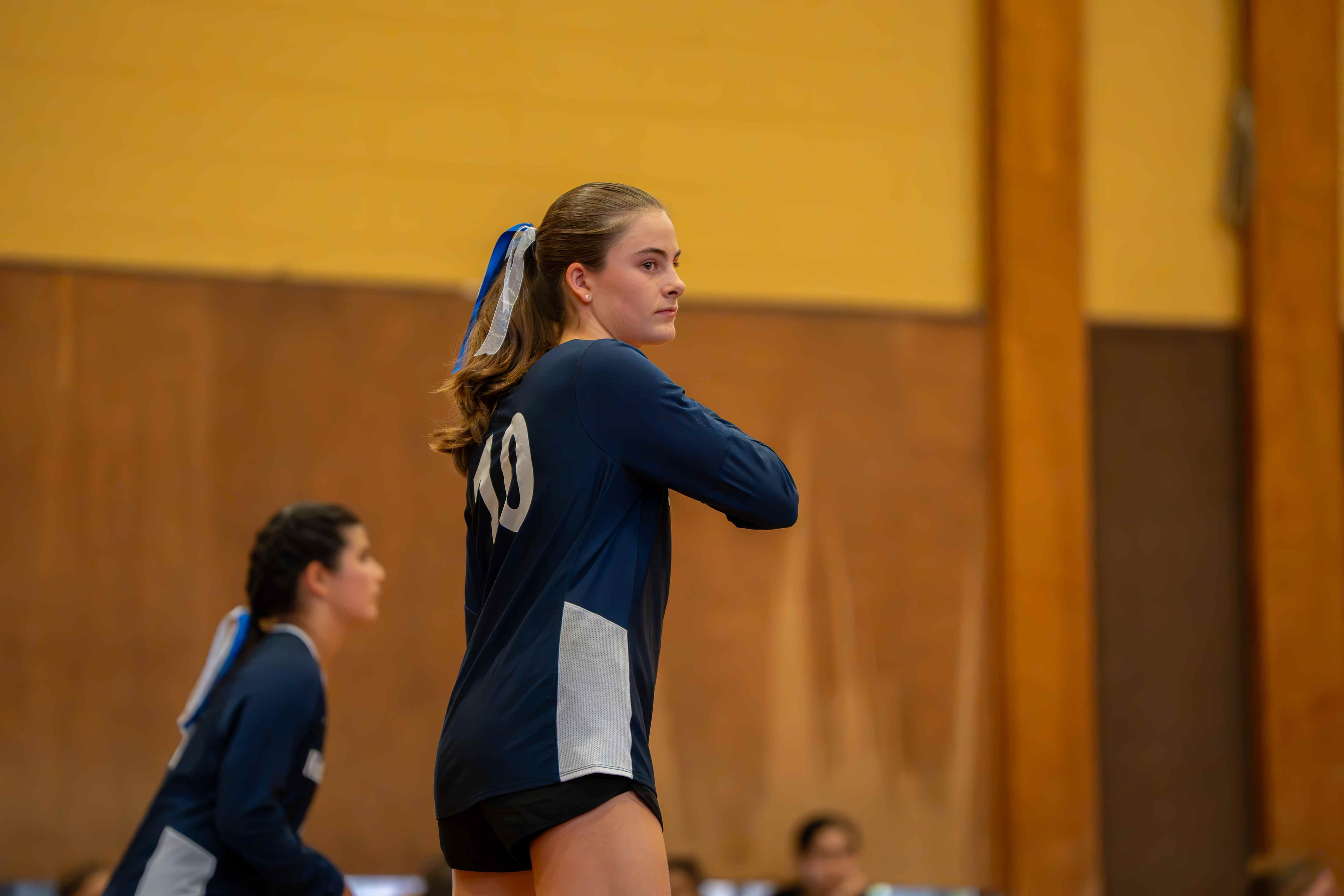 Locked in and tracking the ball across the net.